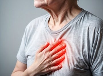 Elderly woman experiencing chest pain.